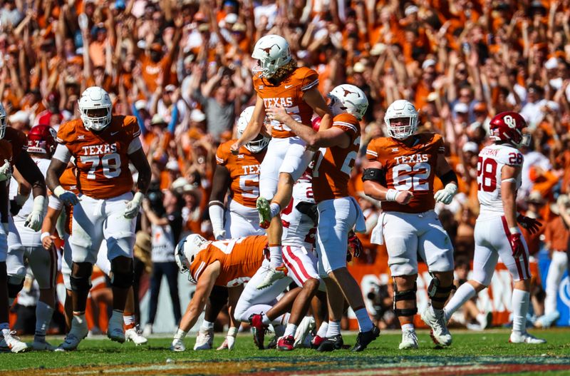 Oct 7, 2023; Dallas, Texas, USA;  Texas Longhorns place kicker Bert Auburn (45) celebrates with teammates after kicking a field goal during the fourth quarter against the Oklahoma Sooners at the Cotton Bowl. Mandatory Credit: Kevin Jairaj-USA TODAY Sports