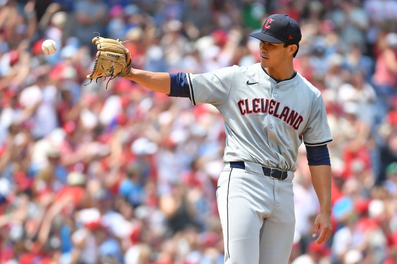 Jul 28, 2024; Philadelphia, Pennsylvania, USA; Cleveland Guardians starting pitcher Joey Cantillo (54) gets a new baseball after allowing a home run against the Philadelphia Phillies during the first inning at Citizens Bank Park. Mandatory Credit: Eric Hartline-USA TODAY Sports