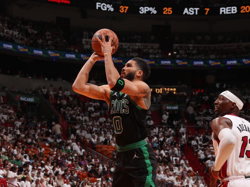 MIAMI, FL - APRIL 27: Jayson Tatum #0 of the Boston Celtics shoots the ball during the game against the Miami Heat during Round 1 Game 3 of the 2024 NBA Playoffs on April 27, 2024 at Kaseya Center in Miami, Florida. NOTE TO USER: User expressly acknowledges and agrees that, by downloading and or using this Photograph, user is consenting to the terms and conditions of the Getty Images License Agreement. Mandatory Copyright Notice: Copyright 2024 NBAE (Photo by Issac Baldizon/NBAE via Getty Images)