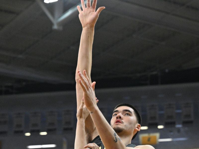 Jan 20, 2024; Iowa City, Iowa, USA; Purdue Boilermakers center Zach Edey (15) shoots the ball over Iowa Hawkeyes forward Owen Freeman (32) during the first half at Carver-Hawkeye Arena. Mandatory Credit: Jeffrey Becker-USA TODAY Sports