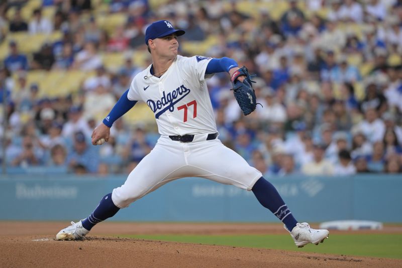 Jul 22, 2024; Los Angeles, California, USA;  Los Angeles Dodgers starting pitcher Ryan River (77) delivers to the plate in the first inning against the San Francisco Giants at Dodger Stadium. Mandatory Credit: Jayne Kamin-Oncea-USA TODAY Sports