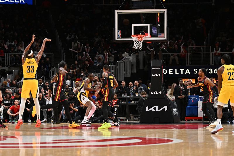 ATLANTA, GEORGIA - JANUARY 12: Myles Turner #33 of the Indiana Pacers shoots the ball during the game against the Atlanta Hawks on January 12, 2024 at State Farm Arena in Atlanta, Georgia.  NOTE TO USER: User expressly acknowledges and agrees that, by downloading and or using this photograph, User is consenting to the terms and conditions of the Getty Images License Agreement. (Photo by Paras Griffin/Getty Images)