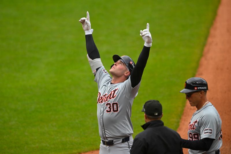Oct 12, 2024; Cleveland, Ohio, USA; Detroit Tigers outfielder Kerry Carpenter (30) celebrates in the fifth inning against the Cleveland Guardians during game five of the ALDS for the 2024 MLB Playoffs at Progressive Field. Mandatory Credit: David Richard-Imagn Images