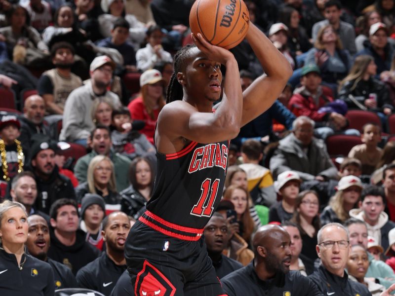 CHICAGO, IL - DECEMBER 6: Ayo Dosunmu #11 of the Chicago Bulls shoots a three point basket during the game against the Chicago Bulls on December 6, 2024 at United Center in Chicago, Illinois. NOTE TO USER: User expressly acknowledges and agrees that, by downloading and or using this photograph, User is consenting to the terms and conditions of the Getty Images License Agreement. Mandatory Copyright Notice: Copyright 2024 NBAE (Photo by Jeff Haynes/NBAE via Getty Images)