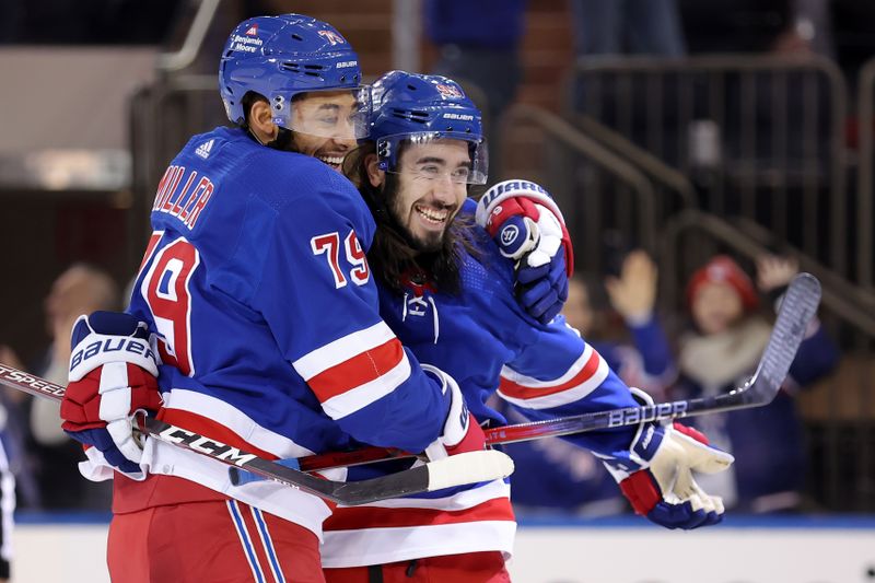 Nov 29, 2023; New York, New York, USA; New York Rangers defenseman K'Andre Miller (79) celebrates his goal against the Detroit Red Wings with center Mika Zibanejad (93) during the third period at Madison Square Garden. Mandatory Credit: Brad Penner-USA TODAY Sports