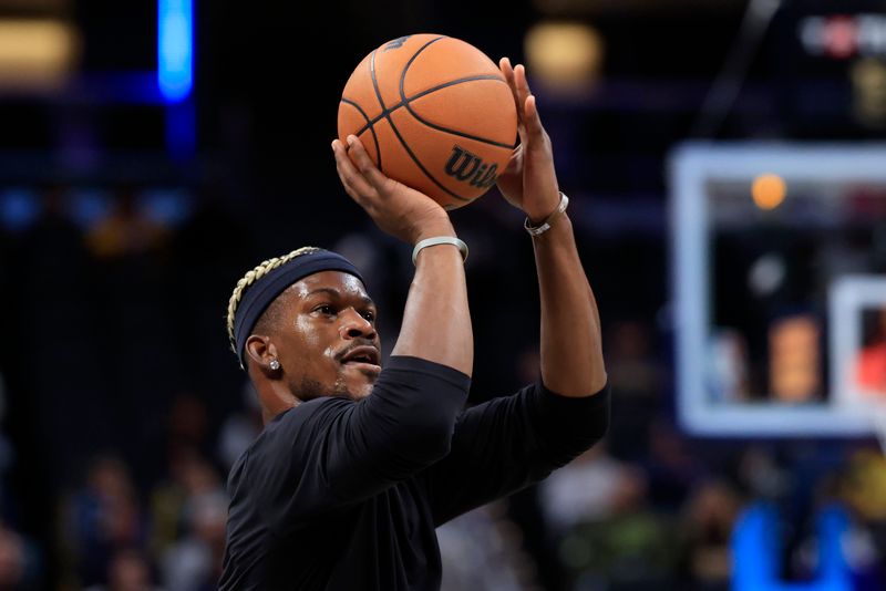 INDIANAPOLIS, INDIANA - NOVEMBER 17: Jimmy Butler #22 of the Miami Heat warms up prior to the game against the Indiana Pacers at Gainbridge Fieldhouse on November 17, 2024 in Indianapolis, Indiana. NOTE TO USER: User expressly acknowledges and agrees that, by downloading and or using this photograph, User is consenting to the terms and conditions of the Getty Images License Agreement. (Photo by Justin Casterline/Getty Images)