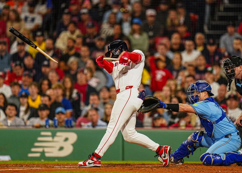 Aug 29, 2024; Boston, Massachusetts, USA; Boston Red Sox Romy Gonzalez (23) breaks his batt in the eighth inning against the Toronto Blue Jays at Fenway Park. Mandatory Credit: David Butler II-USA TODAY Sports