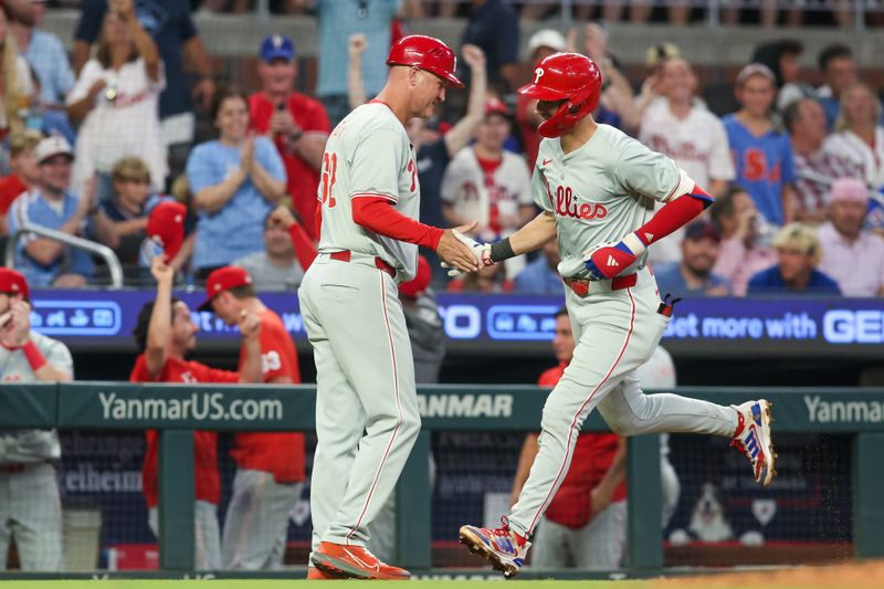 Jul 5, 2024; Atlanta, Georgia, USA; Philadelphia Phillies shortstop Trea Turner (7) hits a two-run home run against the Atlanta Braves in the sixth inning at Truist Park. Mandatory Credit: Brett Davis-USA TODAY Sports