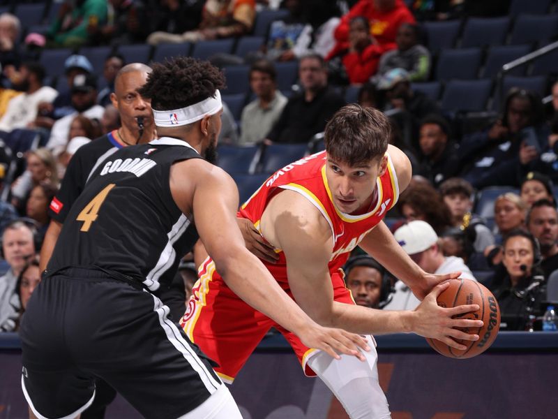 MEMPHIS, TN - MARCH 8: Bogdan Bogdanovic #13 of the Atlanta Hawks handles the ball during the game against the Memphis Grizzlies on March 8, 2024 at FedExForum in Memphis, Tennessee. NOTE TO USER: User expressly acknowledges and agrees that, by downloading and or using this photograph, User is consenting to the terms and conditions of the Getty Images License Agreement. Mandatory Copyright Notice: Copyright 2024 NBAE (Photo by Joe Murphy/NBAE via Getty Images)