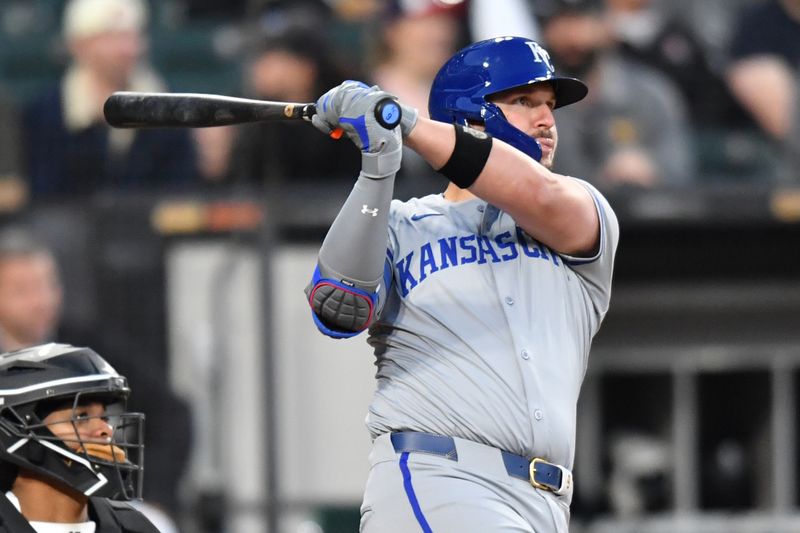 Apr 15, 2024; Chicago, Illinois, USA; Kansas City Royals first baseman Vinnie Pasquantino (9) hits a home run during the fourth inning against the Chicago White Sox at Guaranteed Rate Field. Mandatory Credit: Patrick Gorski-USA TODAY Sports