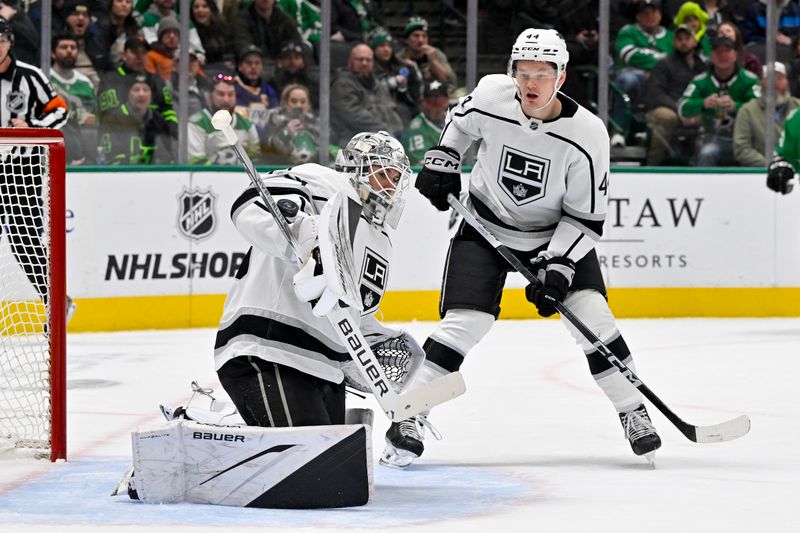 Jan 16, 2024; Dallas, Texas, USA; Los Angeles Kings goaltender Cam Talbot (39) makes a stick save on a Dallas Stars shot as defenseman Mikey Anderson (44) looks on during the second period at the American Airlines Center. Mandatory Credit: Jerome Miron-USA TODAY Sports