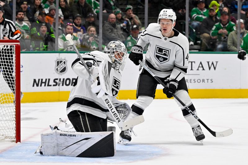 Jan 16, 2024; Dallas, Texas, USA; Los Angeles Kings goaltender Cam Talbot (39) makes a stick save on a Dallas Stars shot as defenseman Mikey Anderson (44) looks on during the second period at the American Airlines Center. Mandatory Credit: Jerome Miron-USA TODAY Sports