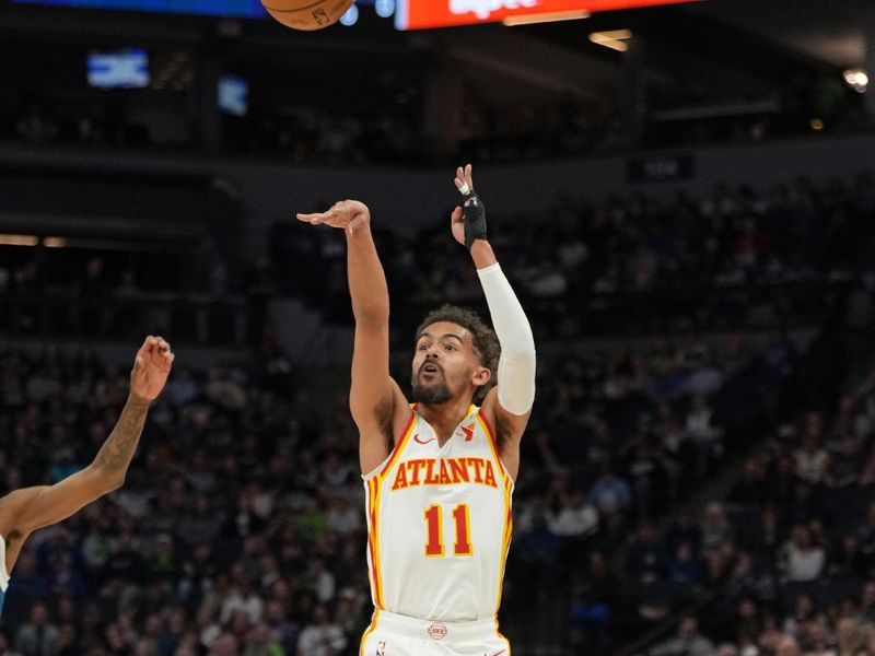 MINNEAPOLIS, MN -  APRIL 12: Trae Young #11 of the Atlanta Hawks shoots the ball during the game against the Minnesota Timberwolves on April 12, 2024 at Target Center in Minneapolis, Minnesota. NOTE TO USER: User expressly acknowledges and agrees that, by downloading and or using this Photograph, user is consenting to the terms and conditions of the Getty Images License Agreement. Mandatory Copyright Notice: Copyright 2024 NBAE (Photo by Jordan Johnson/NBAE via Getty Images)