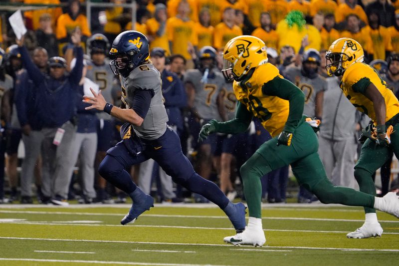 Nov 25, 2023; Waco, Texas, USA; West Virginia Mountaineers quarterback Garrett Greene (6) carries the ball for a 23-yard touchdown against the Baylor Bears during the first half at McLane Stadium. Mandatory Credit: Raymond Carlin III-USA TODAY Sports