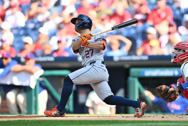 Aug 28, 2024; Philadelphia, Pennsylvania, USA; Houston Astros infielder Jose Altuve (27) hits a double against the Philadelphia Phillies in the first inning at Citizens Bank Park. Mandatory Credit: Kyle Ross-USA TODAY Sports