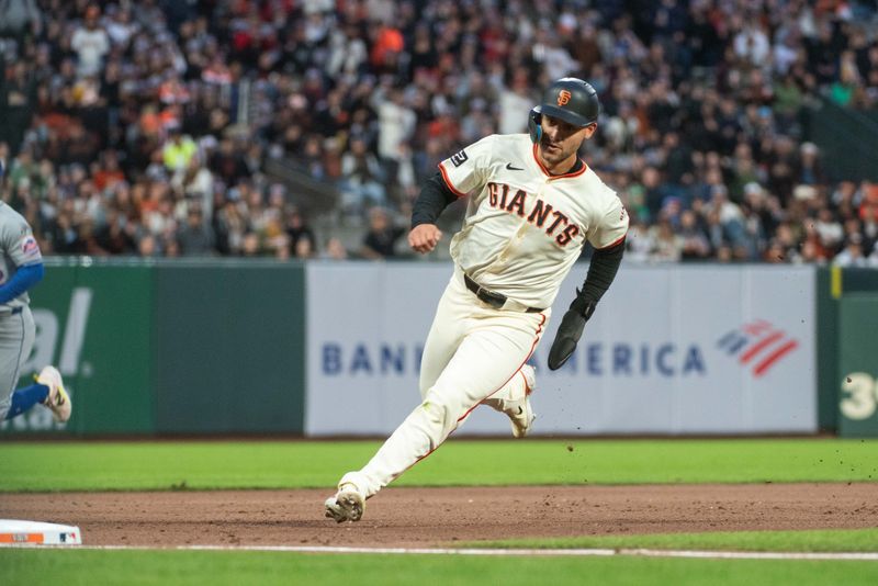 Apr 23, 2024; San Francisco, California, USA; San Francisco Giants outfielder Michael Conforto (8) rounds third base on his way to score during the fifth inning against the New York Mets at Oracle Park. Mandatory Credit: Ed Szczepanski-USA TODAY Sports