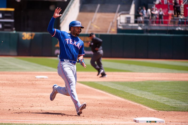 May 7, 2024; Oakland, California, USA; Texas Rangers second base Marcus Semien (2) advances to third base during the third inning of the game against the Oakland Athletics at Oakland-Alameda County Coliseum. Mandatory Credit: Ed Szczepanski-USA TODAY Sports