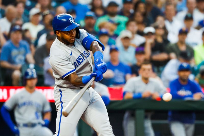 Aug 25, 2023; Seattle, Washington, USA; Kansas City Royals designated hitter Nelson Velazquez (17) hits an RBI-single against the Seattle Mariners during the second inning at T-Mobile Park. Mandatory Credit: Joe Nicholson-USA TODAY Sports