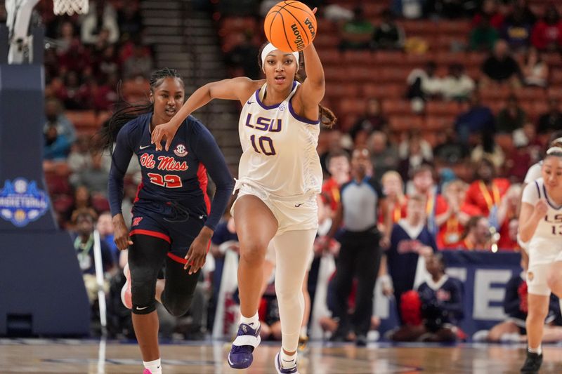 Mar 9, 2024; Greensville, SC, USA;  LSU Lady Tigers forward Angel Reese (10) handles a fast break against the Ole Miss Rebels during the second half at Bon Secours Wellness Arena. Mandatory Credit: Jim Dedmon-USA TODAY Sports