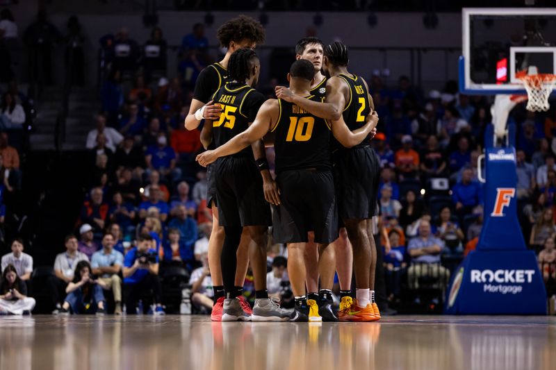 Feb 28, 2024; Gainesville, Florida, USA; Missouri Tigers guard Sean East II (55), guard Nick Honor (10), and guard Tamar Bates (2) huddle during a free throw against the Florida Gators during the first half at Exactech Arena at the Stephen C. O'Connell Center. Mandatory Credit: Matt Pendleton-USA TODAY Sports