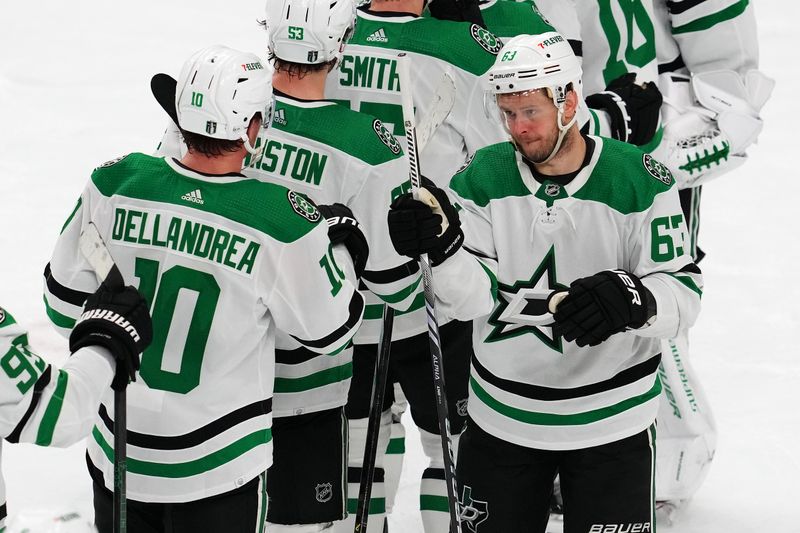 Apr 29, 2024; Las Vegas, Nevada, USA; Dallas Stars right wing Evgenii Dadonov (63) celebrates with Dallas Stars center Ty Dellandrea (10) after the Stars defeated the Vegas Golden Knights 4-2 in game four of the first round of the 2024 Stanley Cup Playoffs at T-Mobile Arena. Mandatory Credit: Stephen R. Sylvanie-USA TODAY Sports