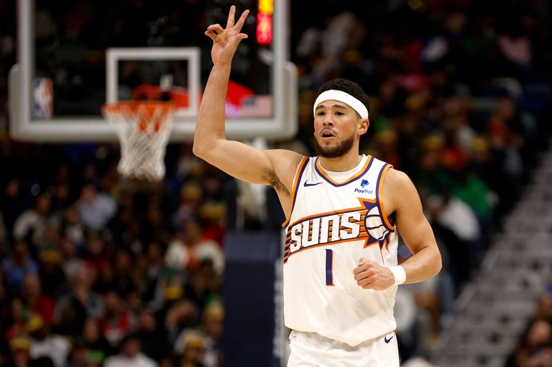 NEW ORLEANS, LOUISIANA - JANUARY 19: Devin Booker #1 of the Phoenix Suns reacts after scoring a three point basket during the third quarter of an NBA game against the New Orleans Pelicans at Smoothie King Center on January 19, 2024 in New Orleans, Louisiana. NOTE TO USER: User expressly acknowledges and agrees that, by downloading and or using this photograph, User is consenting to the terms and conditions of the Getty Images License Agreement. (Photo by Sean Gardner/Getty Images)