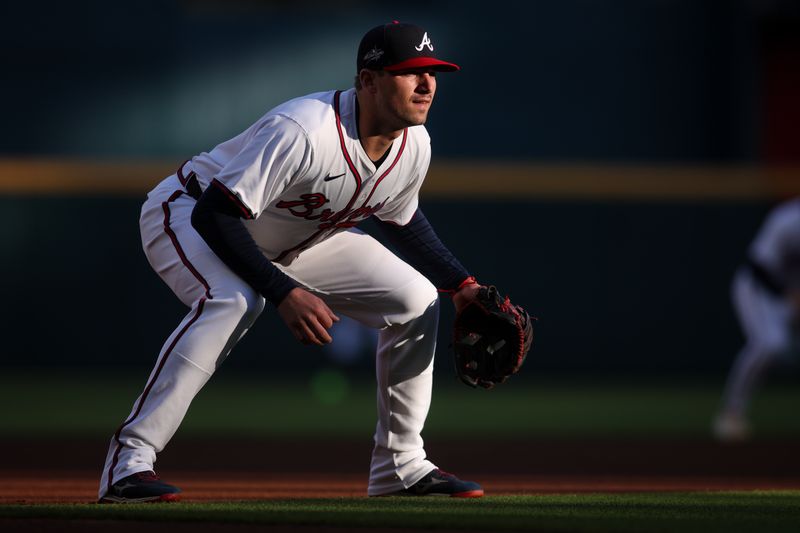 May 5, 2025; Atlanta, Georgia, USA; Atlanta Braves third baseman Austin Riley (27) in action against the Cincinnati Reds in the first inning at Truist Park. Mandatory Credit: Brett Davis-Imagn Images