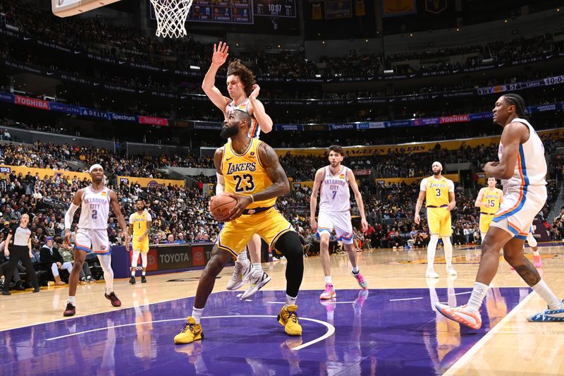 LOS ANGELES, CA - MARCH 4: LeBron James #23 of the Los Angeles Lakers drives to the basket during the game against the Oklahoma City Thunder on March 4, 2024 at Crypto.Com Arena in Los Angeles, California. NOTE TO USER: User expressly acknowledges and agrees that, by downloading and/or using this Photograph, user is consenting to the terms and conditions of the Getty Images License Agreement. Mandatory Copyright Notice: Copyright 2024 NBAE (Photo by Andrew D. Bernstein/NBAE via Getty Images)