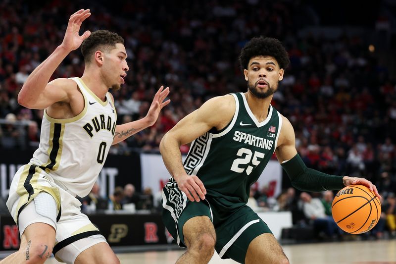 Mar 15, 2024; Minneapolis, MN, USA; Michigan State Spartans forward Malik Hall (25) works around Purdue Boilermakers forward Mason Gillis (0) during the second half at Target Center. Mandatory Credit: Matt Krohn-USA TODAY Sports