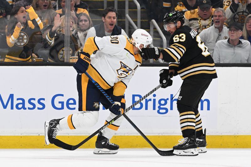 Oct 14, 2023; Boston, Massachusetts, USA; Boston Bruins left wing Brad Marchand (63) and Nashville Predators center Ryan O'Reilly (90) shove each other after the whistle  during the second period at the TD Garden. Mandatory Credit: Brian Fluharty-USA TODAY Sports