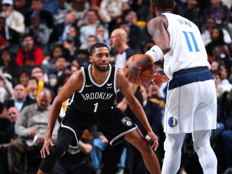 BROOKLYN, NY - FEBRUARY 6: Mikal Bridges #1 of the Brooklyn Nets plays defense during the game  against Kyrie Irving #11 of the Dallas Mavericks on February 6, 2024 at Barclays Center in Brooklyn, New York. NOTE TO USER: User expressly acknowledges and agrees that, by downloading and or using this Photograph, user is consenting to the terms and conditions of the Getty Images License Agreement. Mandatory Copyright Notice: Copyright 2024 NBAE (Photo by David L. Nemec/NBAE via Getty Images)