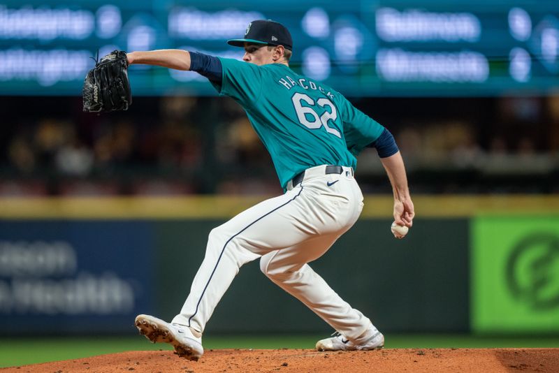 Sep 28, 2024; Seattle, Washington, USA; Seattle Mariners starter Emerson Hancock (62) delivers a pitch during the second inning against the Oakland Athletics at T-Mobile Park. Mandatory Credit: Stephen Brashear-Imagn Images