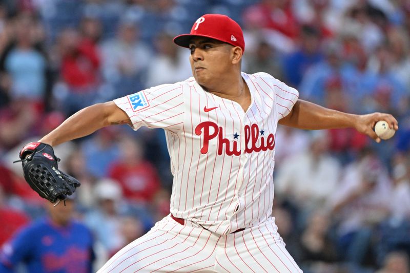 Sep 9, 2025; Philadelphia, Pennsylvania, USA; Philadelphia Phillies pitcher Ranger Suárez (55) throws a pitch during the first inning against the New York Mets at Citizens Bank Park. Mandatory Credit: Eric Hartline-Imagn Images