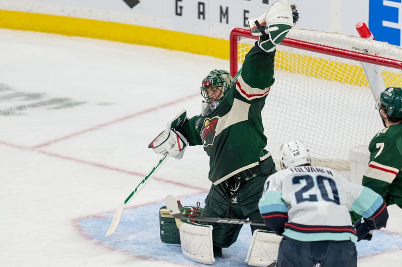 Apr 18, 2024; Saint Paul, Minnesota, USA; Minnesota Wild goaltender Marc-Andre Fleury (29) makes a glove save against the Seattle Kraken in the second period at Xcel Energy Center. Mandatory Credit: Matt Blewett-USA TODAY Sports