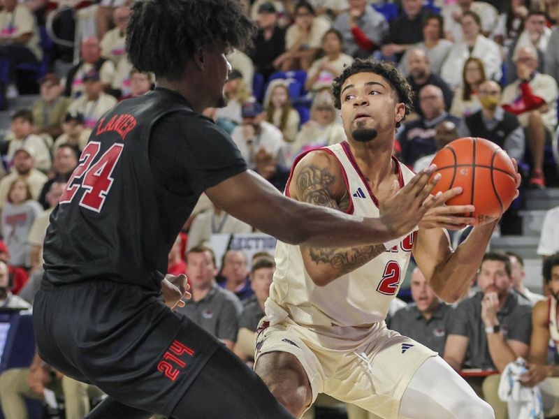 Feb 22, 2024; Boca Raton, Florida, USA; Florida Atlantic Owls guard Nicholas Boyd (2) protects the basketball from Southern Methodist Mustangs guard Emory Lanier (24) during the second half at Eleanor R. Baldwin Arena. Mandatory Credit: Sam Navarro-USA TODAY Sports