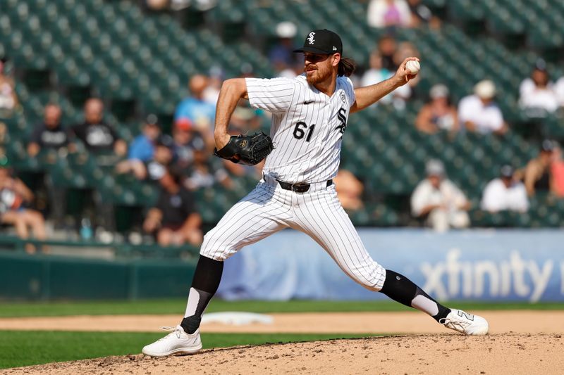 Sep 15, 2024; Chicago, Illinois, USA; Chicago White Sox relief pitcher Jared Shuster (51) delivers a pitch against the Oakland Athletics during the ninth inning at Guaranteed Rate Field. Mandatory Credit: Kamil Krzaczynski-Imagn Images