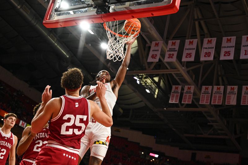 Jan 31, 2023; College Park, Maryland, USA;  Maryland Terrapins forward Julian Reese (10) shoots over Indiana Hoosiers forward Race Thompson (25) during the second half at Xfinity Center. Mandatory Credit: Tommy Gilligan-USA TODAY Sports