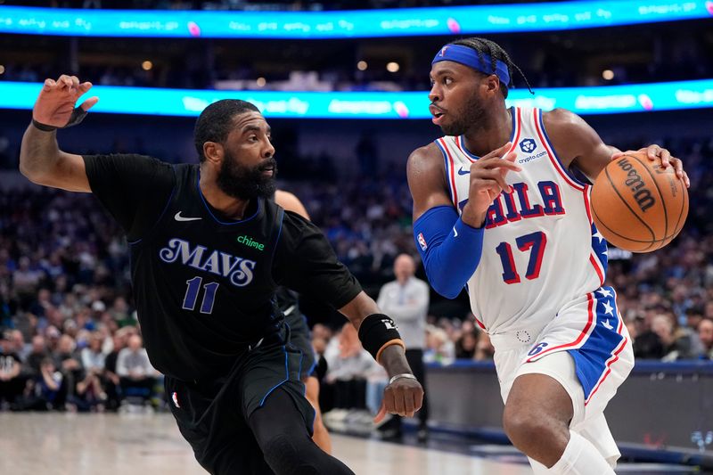 DALLAS, TEXAS - MARCH 03: Buddy Hield #17 of the Philadelphia 76ers is defended by Kyrie Irving #11 of the Dallas Mavericks during the first half at American Airlines Center on March 03, 2024 in Dallas, Texas. NOTE TO USER: User expressly acknowledges and agrees that, by downloading and or using this photograph, User is consenting to the terms and conditions of the Getty Images License Agreement. (Photo by Sam Hodde/Getty Images)