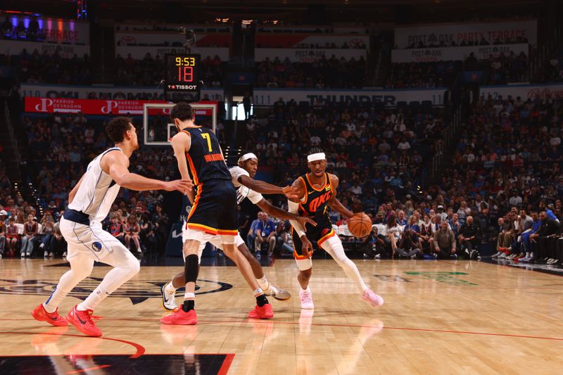 OKLAHOMA CITY, OK - APRIL 14: Shai Gilgeous-Alexander #2 of the Oklahoma City Thunder dribbles the ball during the game against the Dallas Mavericks  on April 14, 2024 at Paycom Arena in Oklahoma City, Oklahoma. NOTE TO USER: User expressly acknowledges and agrees that, by downloading and or using this photograph, User is consenting to the terms and conditions of the Getty Images License Agreement. Mandatory Copyright Notice: Copyright 2024 NBAE (Photo by Zach Beeker/NBAE via Getty Images)