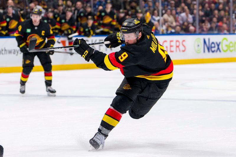 Mar 25, 2024; Vancouver, British Columbia, CAN; Vancouver Canucks forward J.T. Miller (9) shoots against the Los Angeles Kings in the third period at Rogers Arena. Kings won 3 -2. Mandatory Credit: Bob Frid-USA TODAY Sports