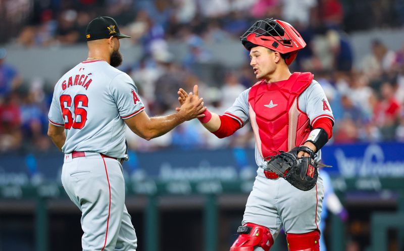 May 19, 2024; Arlington, Texas, USA; Los Angeles Angels pitcher Luis Garcia (66) celebrates with Los Angeles Angels catcher Matt Thaiss (21) after the game against the Texas Rangers at Globe Life Field. Mandatory Credit: Kevin Jairaj-USA TODAY Sports