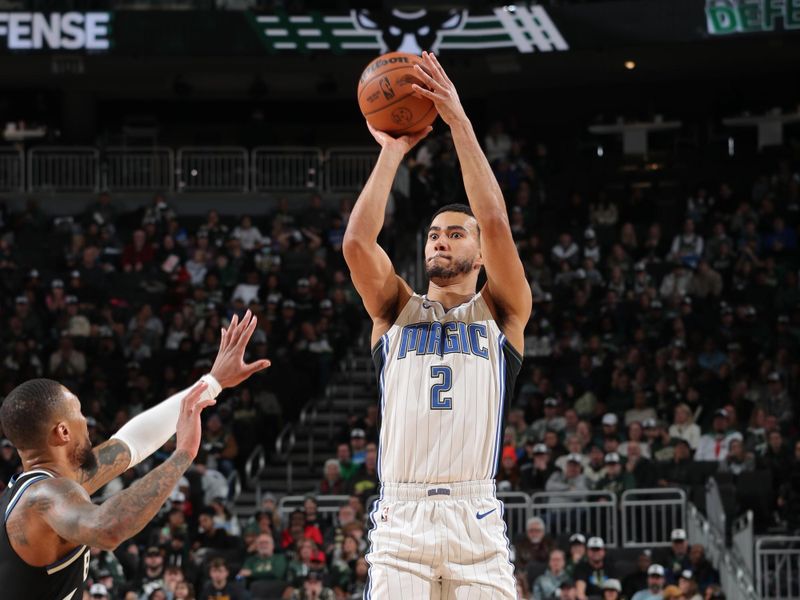 MILWAUKEE, WI - JANUARY 15:  Caleb Houstan #2 of the Orlando Magic shoots the ball during the game against the Milwaukee Bucks on January 15, 2025 at Fiserv Forum Center in Milwaukee, Wisconsin. NOTE TO USER: User expressly acknowledges and agrees that, by downloading and or using this Photograph, user is consenting to the terms and conditions of the Getty Images License Agreement. Mandatory Copyright Notice: Copyright 2025 NBAE (Photo by Gary Dineen/NBAE via Getty Images).