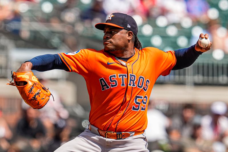 Sep 14, 2025; Cumberland, Georgia, USA; Houston Astros starting pitcher Framber Valdez (59) pitches against the Atlanta Braves during the second inning at Truist Park. Mandatory Credit: Dale Zanine-Imagn Images