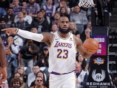 SACRAMENTO, CA - OCTOBER 29: LeBron James #23 of the Los Angeles Lakers sets the play during the game against the Sacramento Kings on October 29, 2023 at Golden 1 Center in Sacramento, California. NOTE TO USER: User expressly acknowledges and agrees that, by downloading and or using this Photograph, user is consenting to the terms and conditions of the Getty Images License Agreement. Mandatory Copyright Notice: Copyright 2023 NBAE (Photo by Rocky Widner/NBAE via Getty Images)