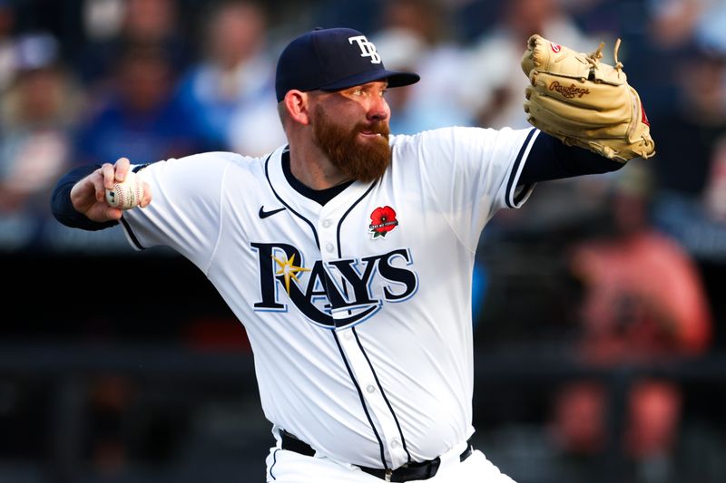 May 26, 2025; Tampa, Florida, USA; Tampa Bay Rays starting pitcher Zack Littell (52) throws a pitch against the Minnesota Twins in the first inning at George M. Steinbrenner Field. Mandatory Credit: Nathan Ray Seebeck-Imagn Images