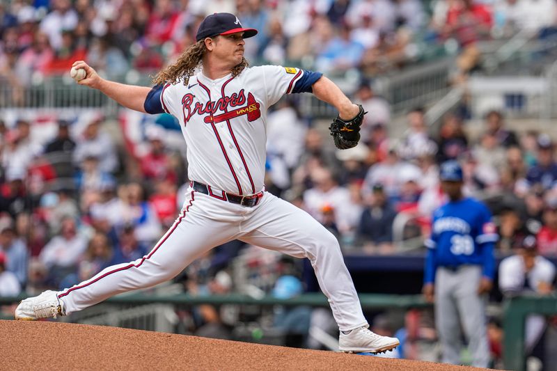 Mar 29, 2026; Cumberland, Georgia, USA; Atlanta Braves pitcher Grant Holmes (66) pitches against the Kansas City Royals during the first inning at Truist Park. Mandatory Credit: Dale Zanine-Imagn Images