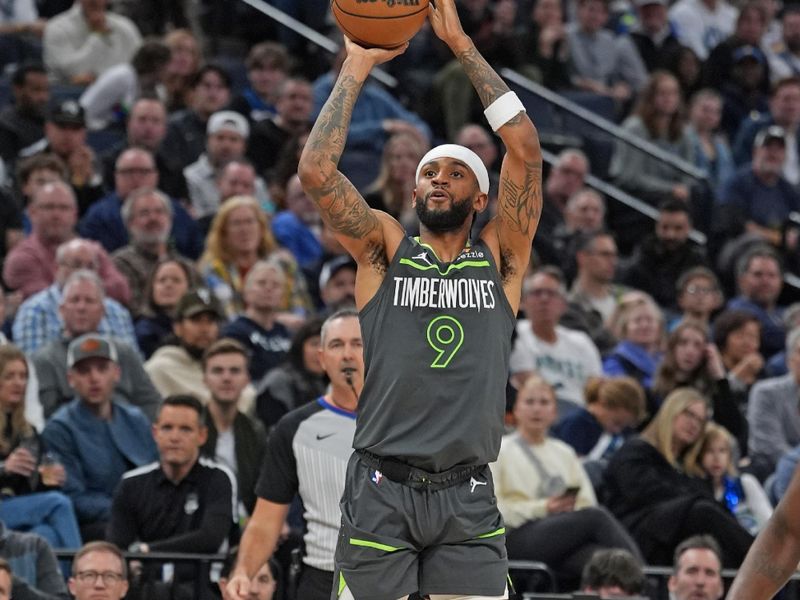 MINNEAPOLIS, MN - NOVEMBER 1: Nickeil Alexander-Walker #9 of the Minnesota Timberwolves shoots a three point basket during the game against the Denver Nuggets on November 1, 2024 at Target Center in Minneapolis, Minnesota. NOTE TO USER: User expressly acknowledges and agrees that, by downloading and or using this Photograph, user is consenting to the terms and conditions of the Getty Images License Agreement. Mandatory Copyright Notice: Copyright 2024 NBAE (Photo by Jordan Johnson/NBAE via Getty Images)