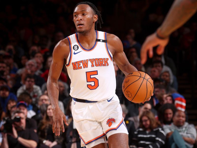 NEW YORK, NY - MARCH 27: Immanuel Quickley #5 of the New York Knicks dribbles the ball during the game against the Houston Rockets on March 27, 2023 at Madison Square Garden in New York City, New York.  NOTE TO USER: User expressly acknowledges and agrees that, by downloading and or using this photograph, User is consenting to the terms and conditions of the Getty Images License Agreement. Mandatory Copyright Notice: Copyright 2023 NBAE  (Photo by Nathaniel S. Butler/NBAE via Getty Images)