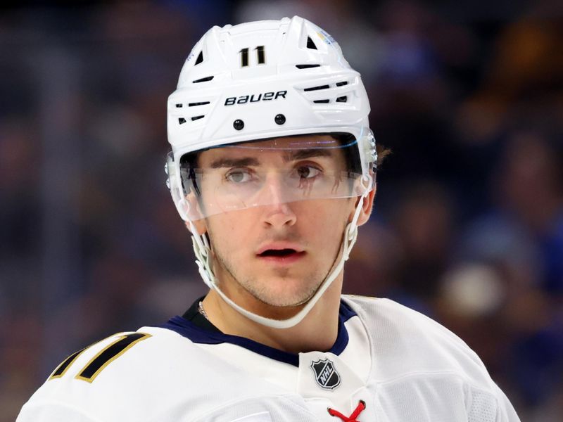 Jan 12, 2026; Buffalo, New York, USA;  Florida Panthers right wing MacKie Samoskevich (11) during a stoppage in play against the Buffalo Sabres at KeyBank Center. Mandatory Credit: Timothy T. Ludwig-Imagn Images