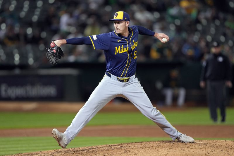 Aug 23, 2024; Oakland, California, USA; Milwaukee Brewers relief pitcher Bryan Hudson (52) throws a pitch against the Oakland Athletics during the fifth inning at Oakland-Alameda County Coliseum. Mandatory Credit: Darren Yamashita-USA TODAY Sports